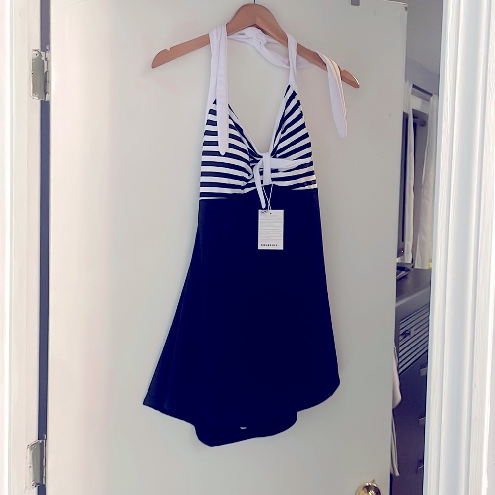 Plus size swim dress- black and white striped. Swim dress, with built in shorts.